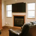 Living room with TV and full size murphy bed